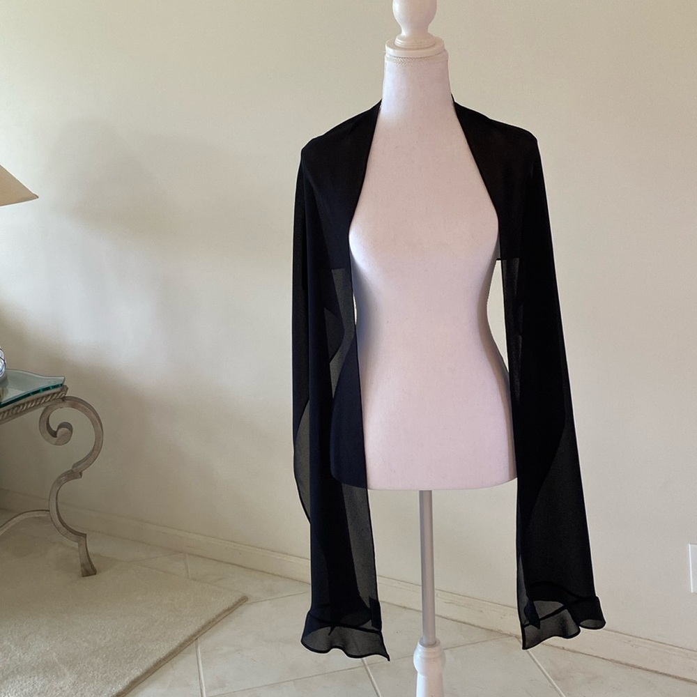 Black sheer stole with slight ruffle at the ends. Very pretty. 80" total length.
